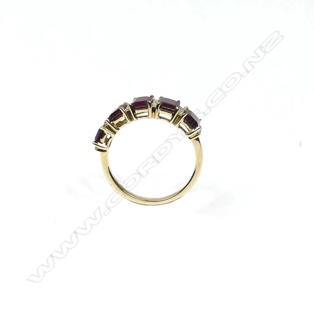 A 14ct yellow gold ruby and diamond ring Image 1++