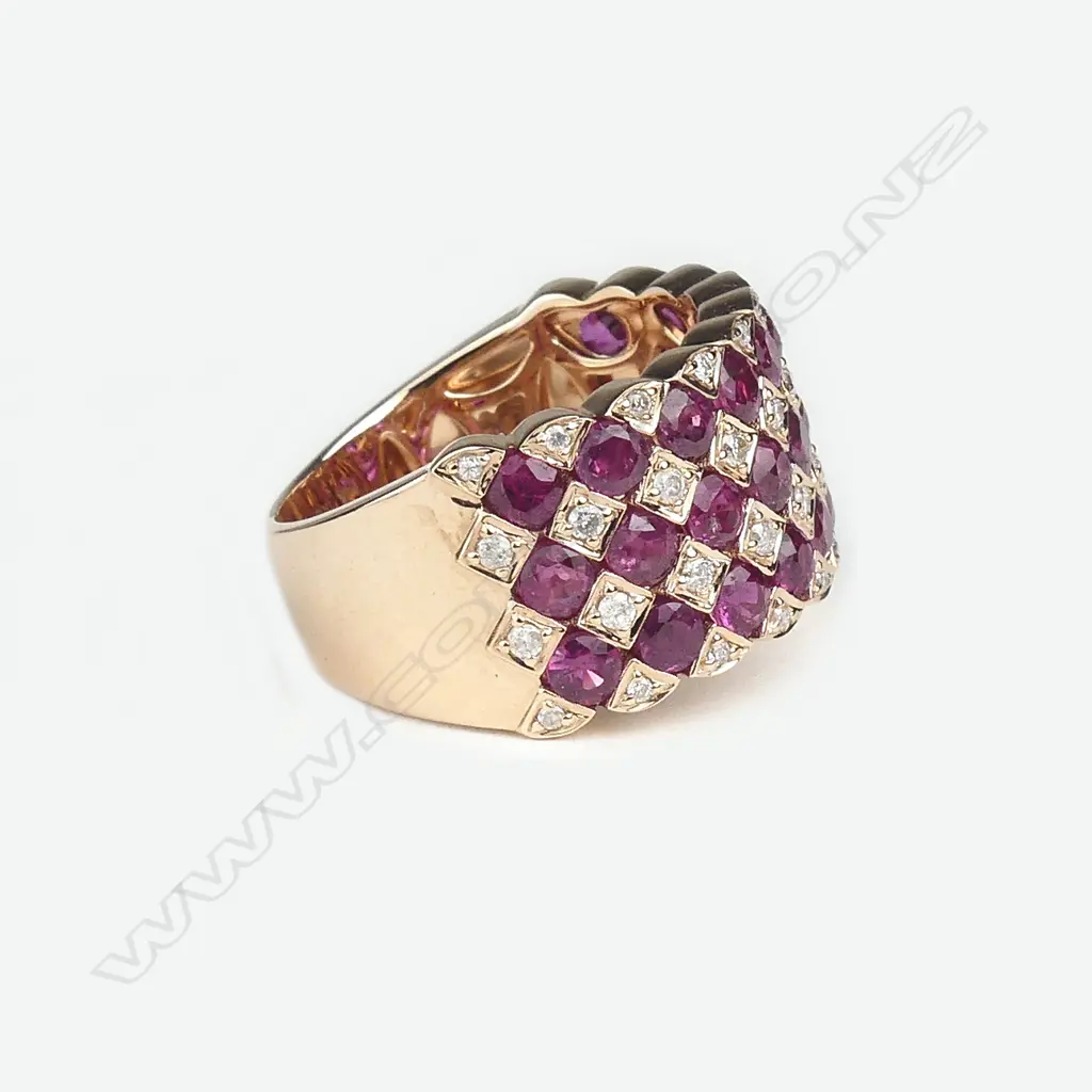 A 14ct rose gold ruby and diamond ring Image 1++
