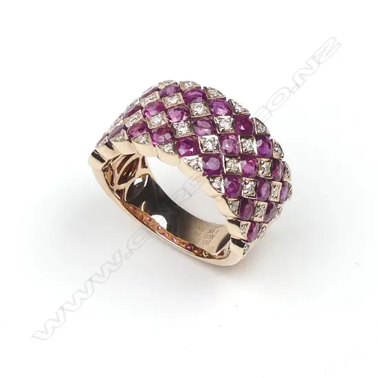 A 14ct rose gold ruby and diamond ring