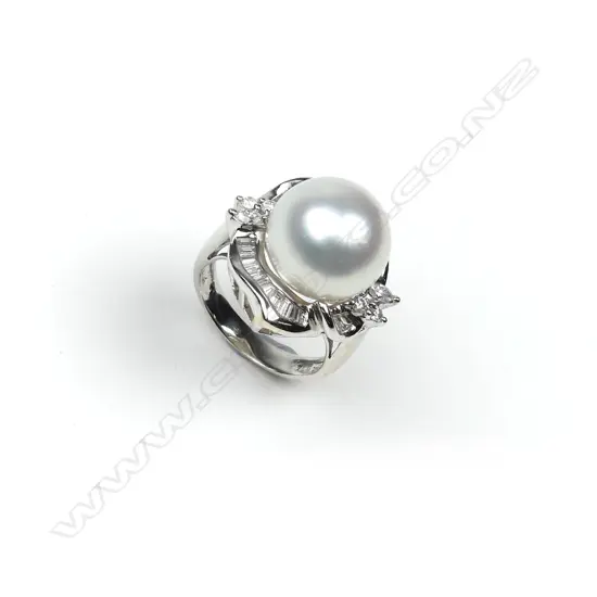 An 18ct white gold pearl and diamond ring