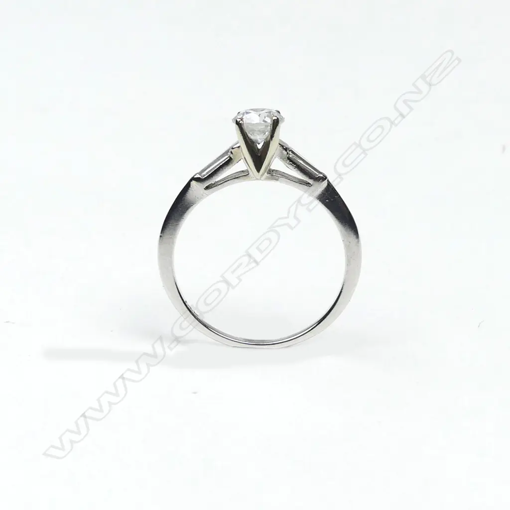 An 18ct white gold and diamond solitaire ring Image 1++