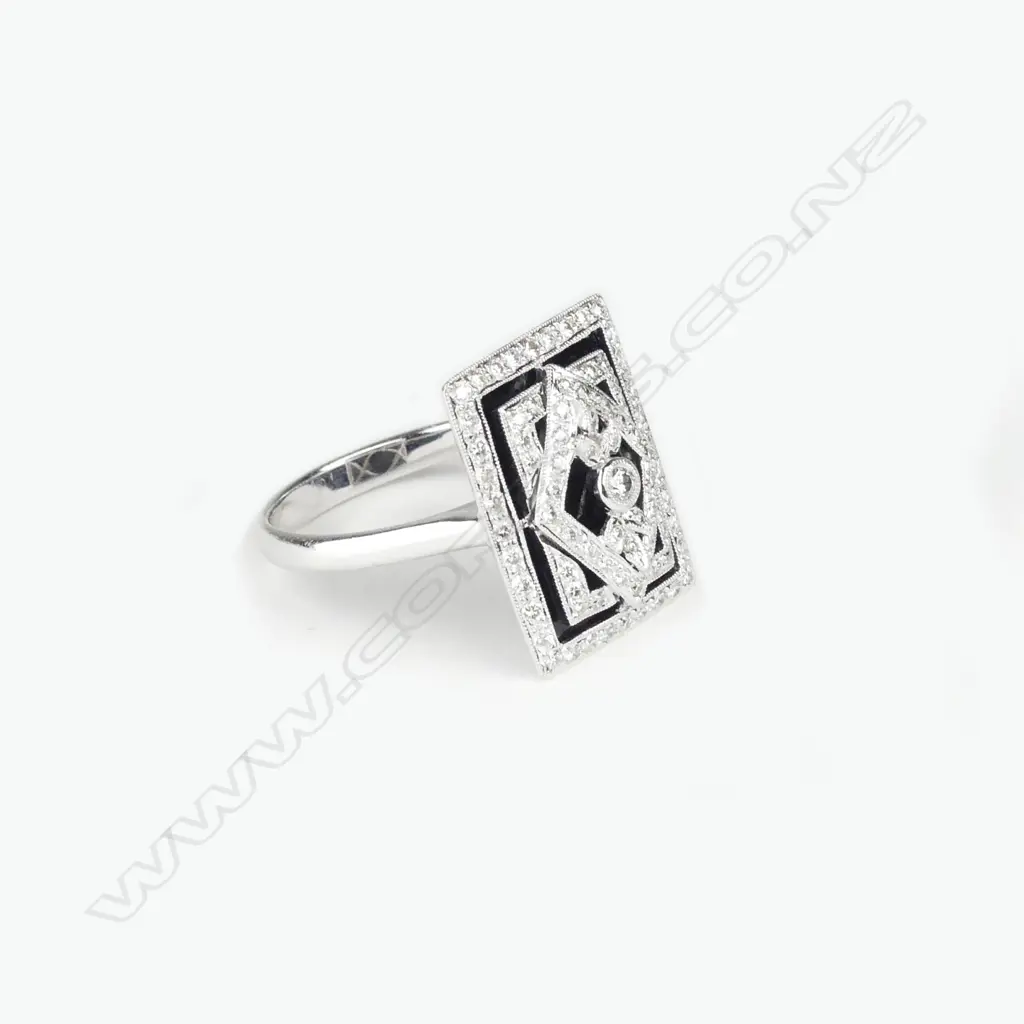 An 18ct white gold and diamond Art Deco style ring Image 1++