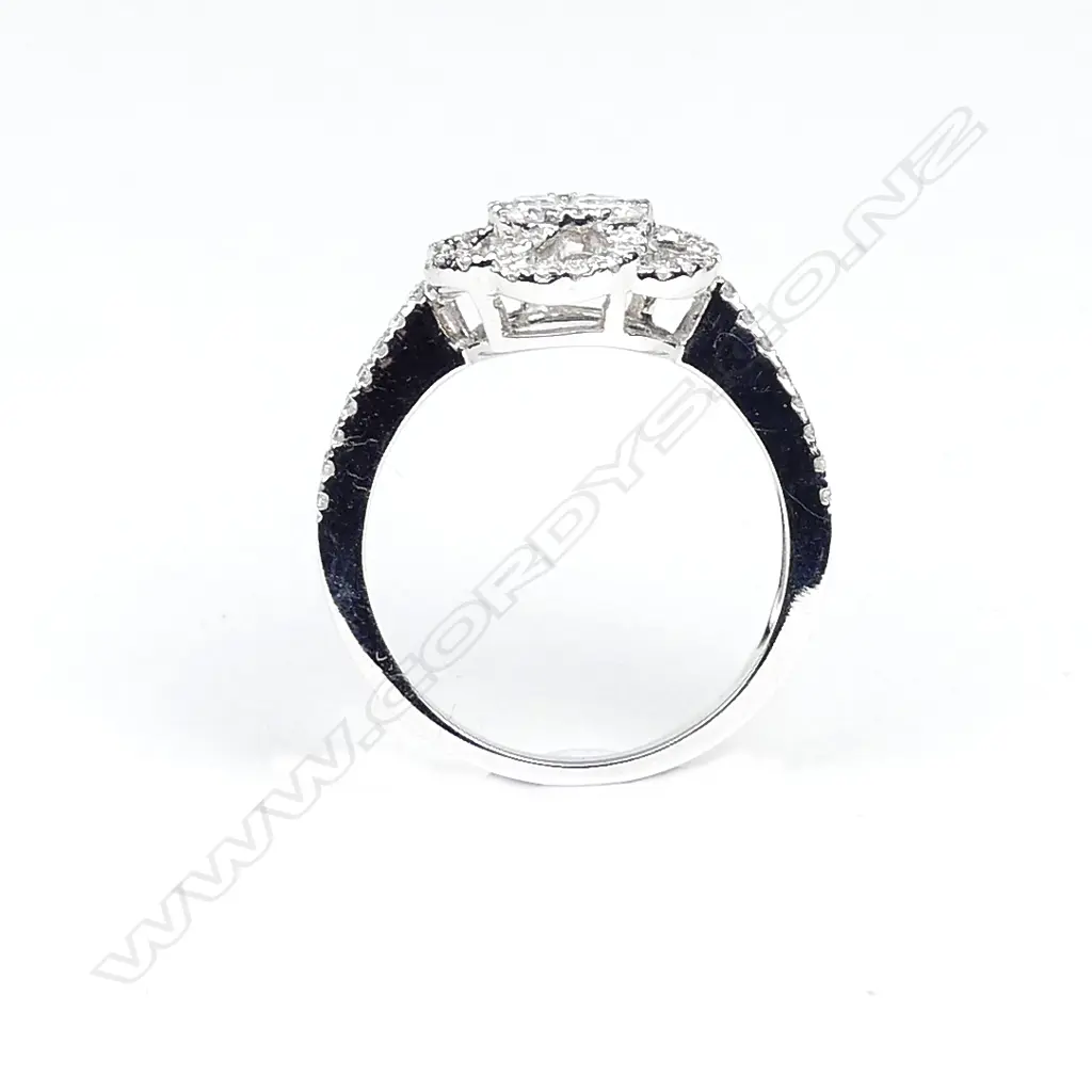 An 18ct white gold and diamond dress ring Image 1++