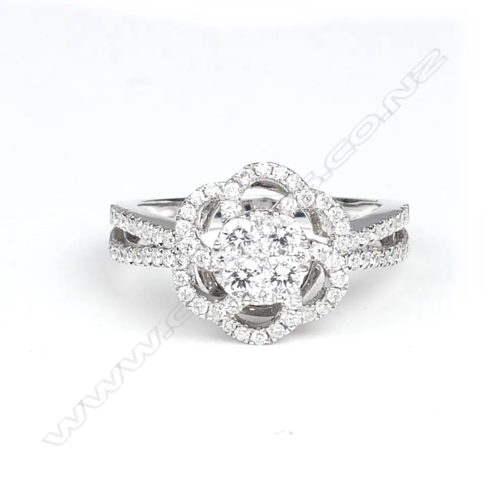 An 18ct white gold and diamond dress ring Image 1++