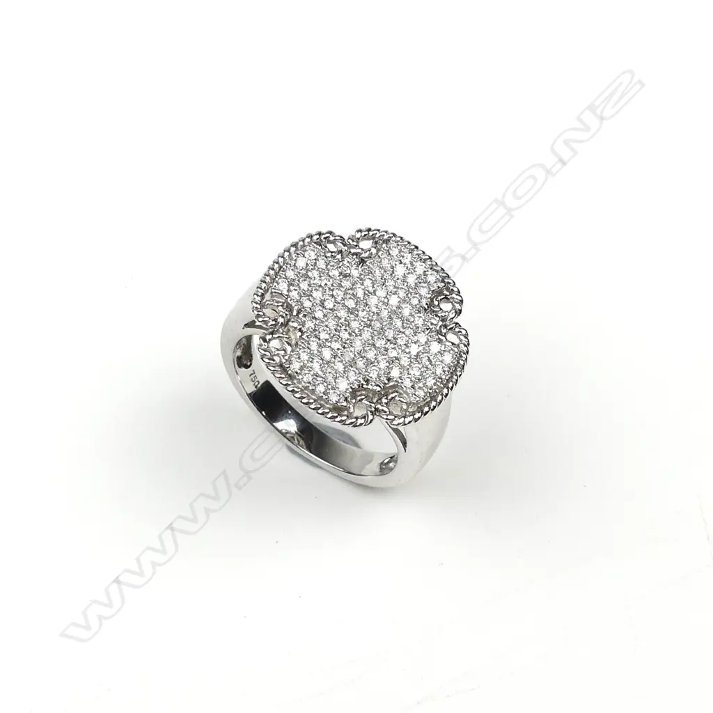 An 18ct white gold and diamond ring Image 1++