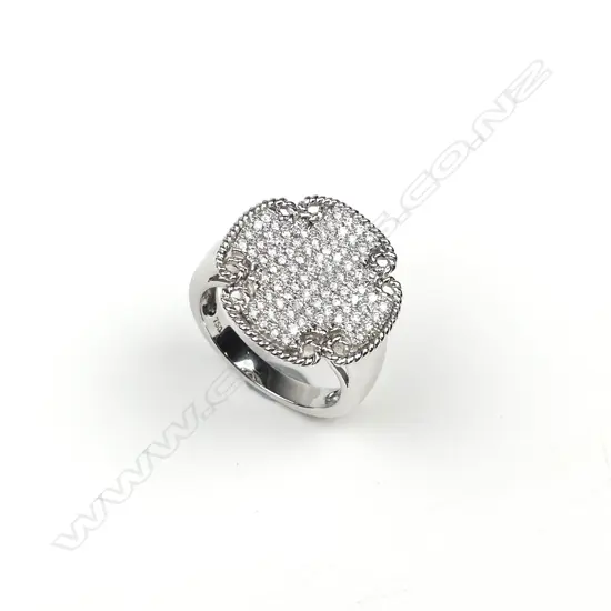 An 18ct white gold and diamond ring