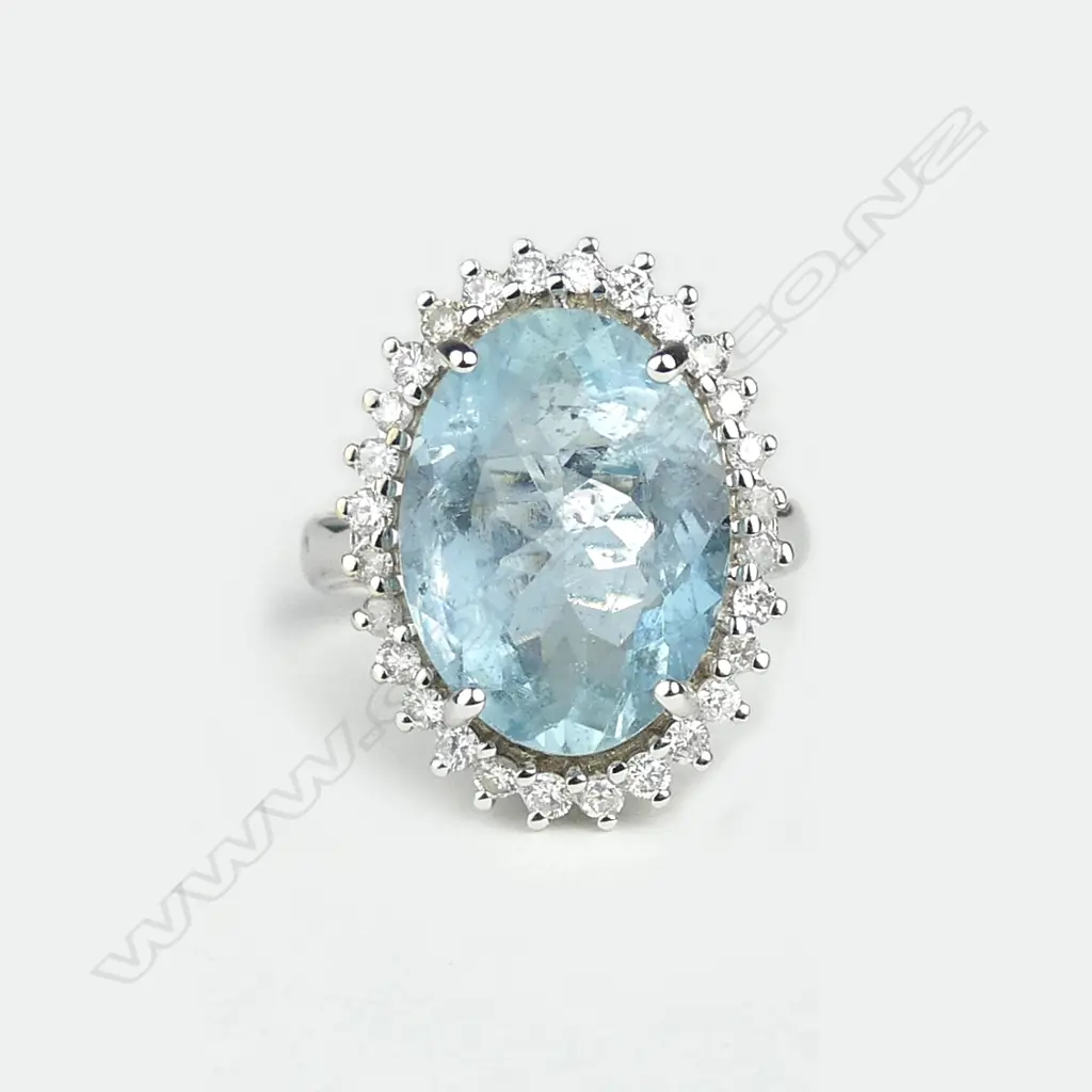A 14ct white gold aquamarine and diamond ring Image 1++
