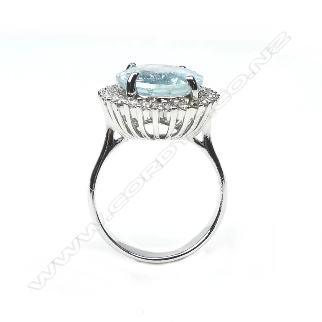 A 14ct white gold aquamarine and diamond ring Image 1++