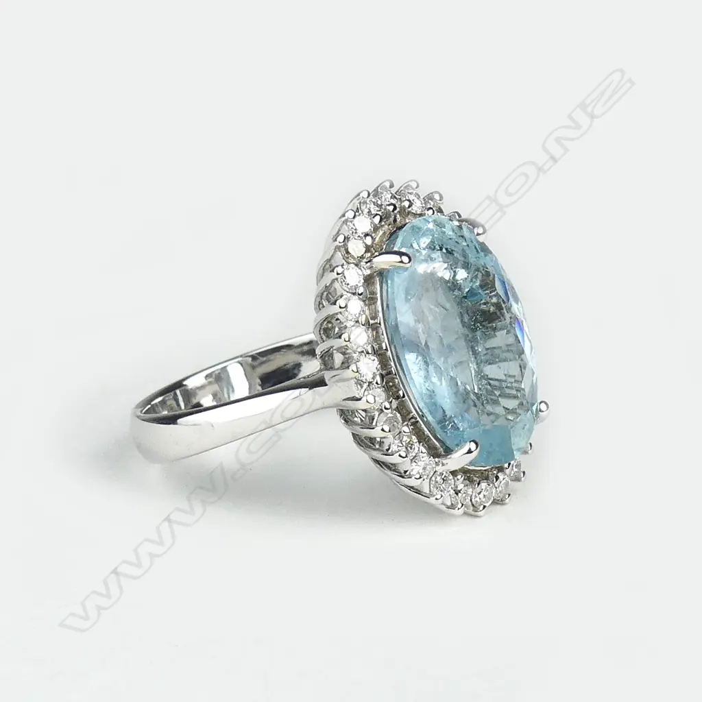A 14ct white gold aquamarine and diamond ring Image 1++