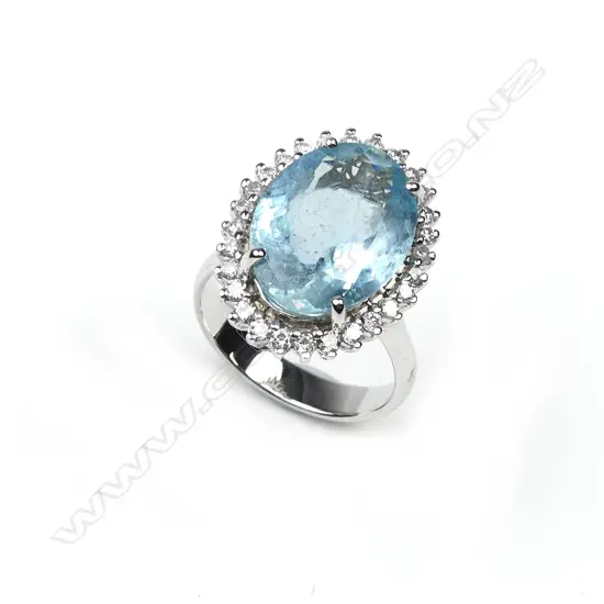 A 14ct white gold aquamarine and diamond ring