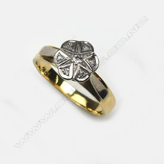 An 18ct yellow and white gold diamond cluster ring