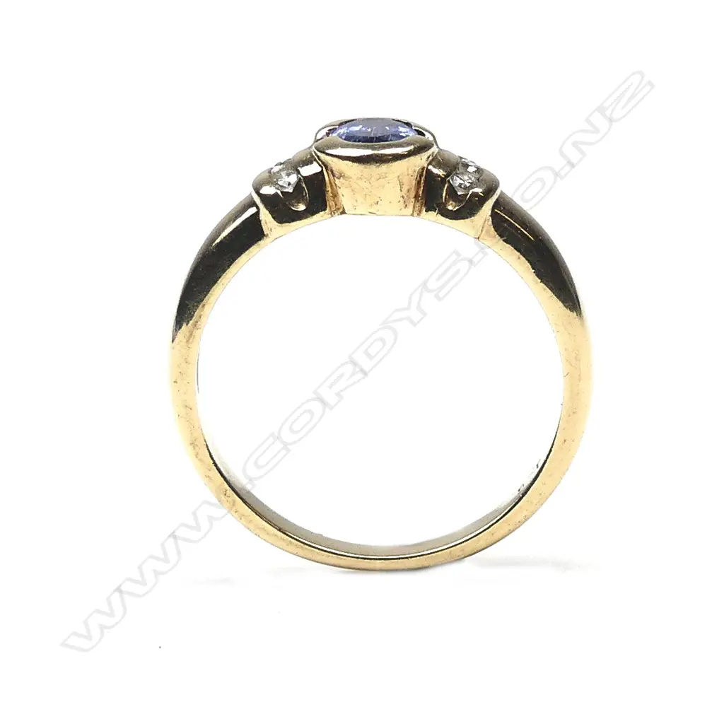 A 9ct. yellow gold sapphire and diamond ring Image 1++