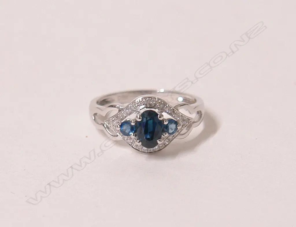 An 18ct white gold and sapphire ring Image 1++