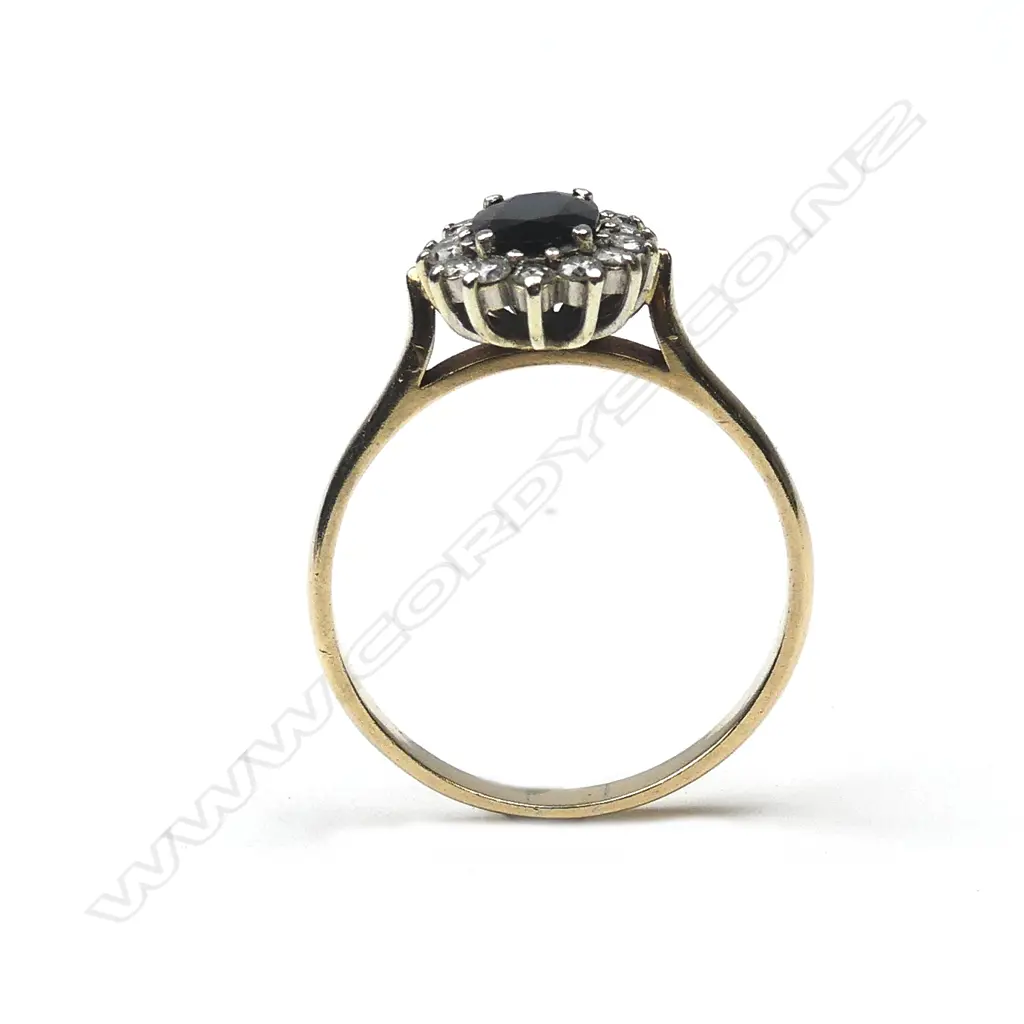 A 9ct gold sapphire and diamond cluster ring Image 1++