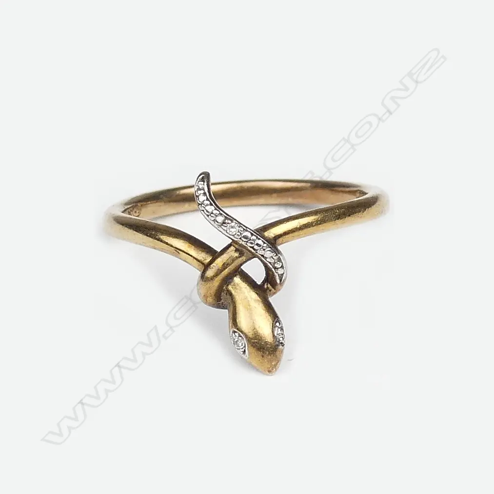 A vintage 9ct. yellow gold and diamond set snake ring Image 1++