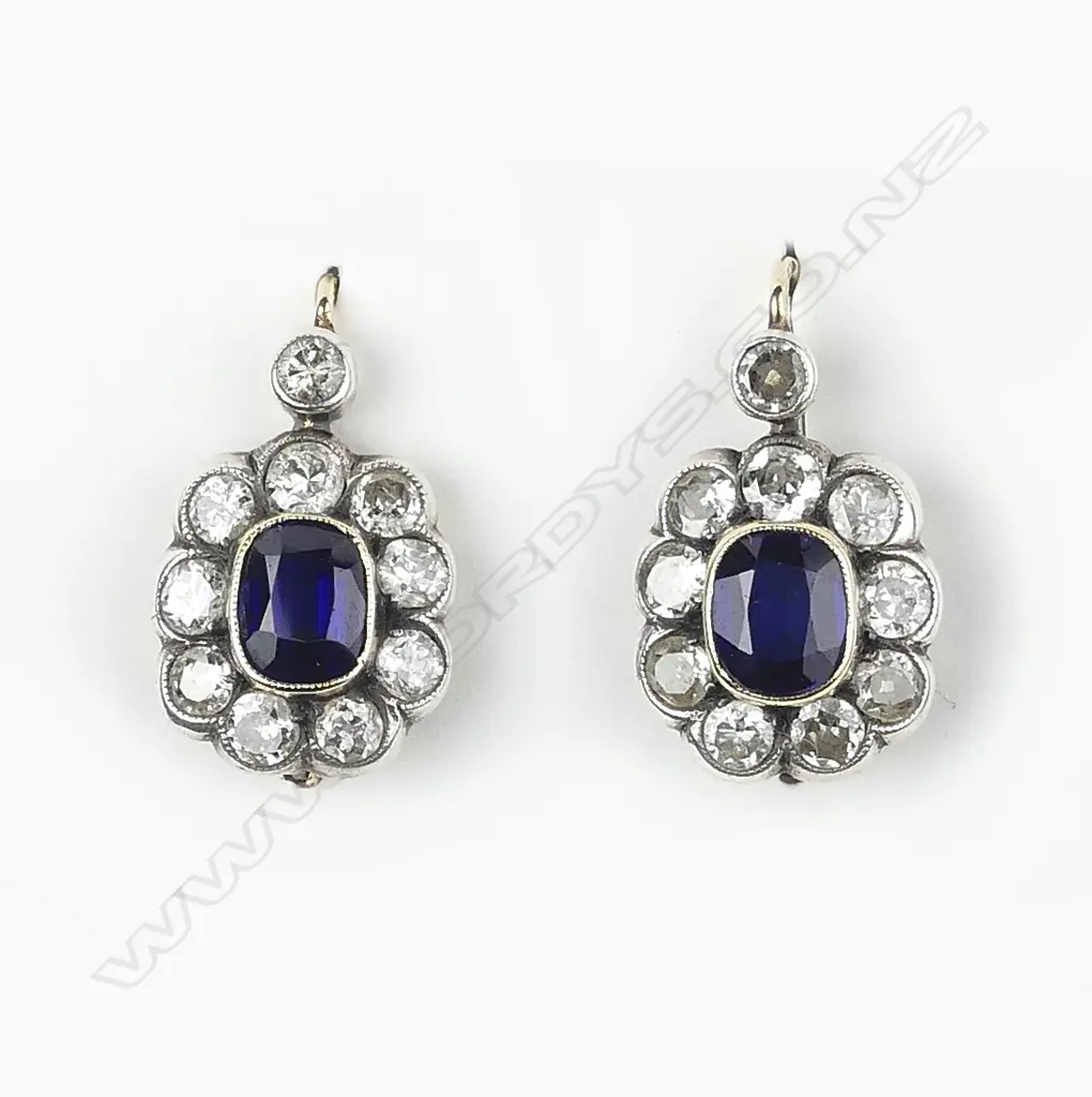 A pair of early 20thC white and yellow gold sapphire and diamond earrings Image 1++