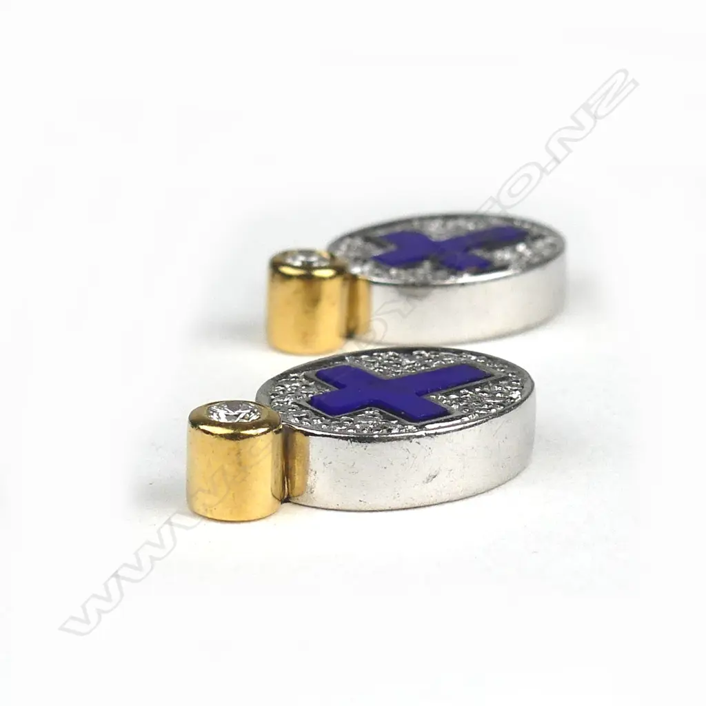 A pair of modern 18ct. yellow and white gold diamond and enamel earrings Image 1++