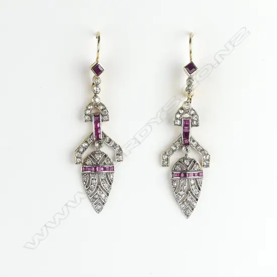 A pair of Art Deco gold diamond and ruby drop earrings