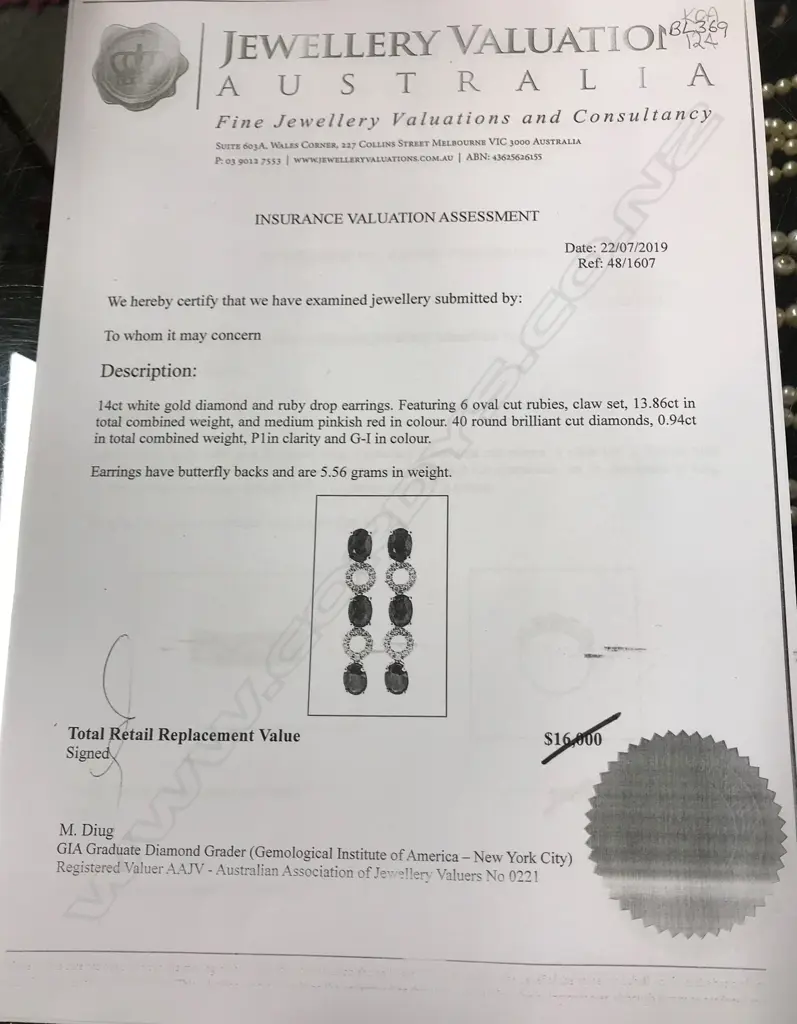 A pair of 14ct gold ruby and diamond drop earrings Image 1++