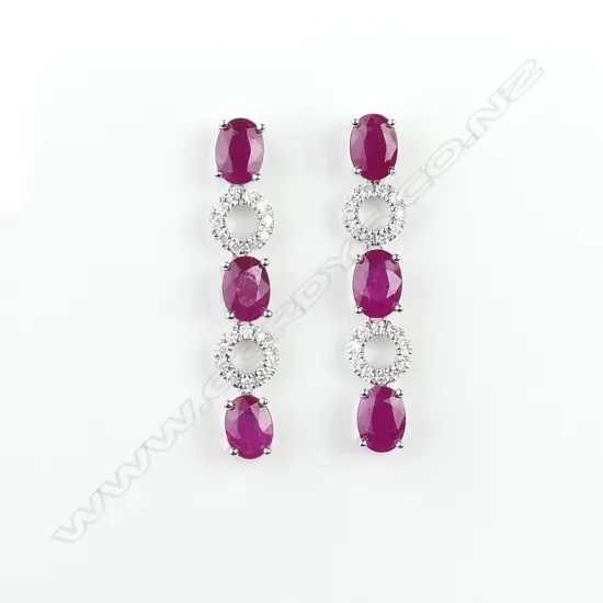 A pair of 14ct gold ruby and diamond drop earrings