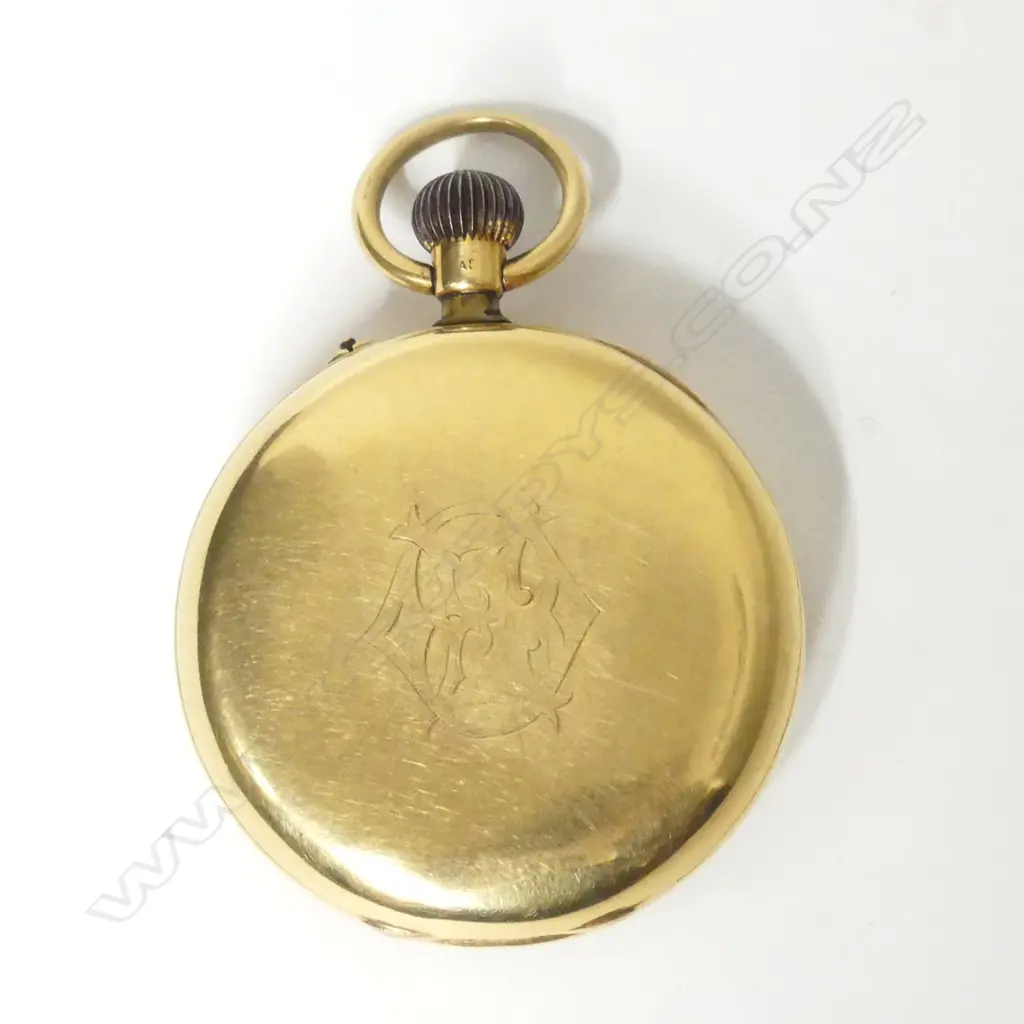 An 18ct gold open face pocket watch Image 1++
