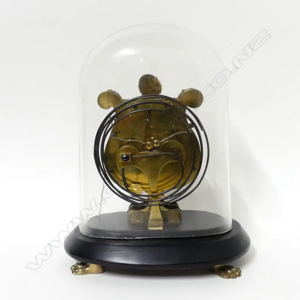 A small lyre shaped boudoir clock Image 1++