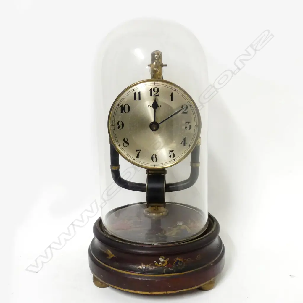 An 800-day Bulle electromechanical clock under glass dome Image 1++