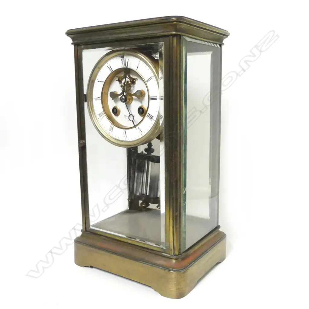 A French brass four-glass clock Image 1++