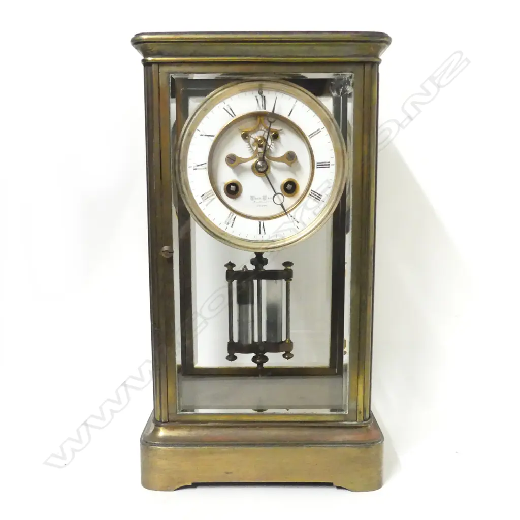 A French brass four-glass clock Image 1++