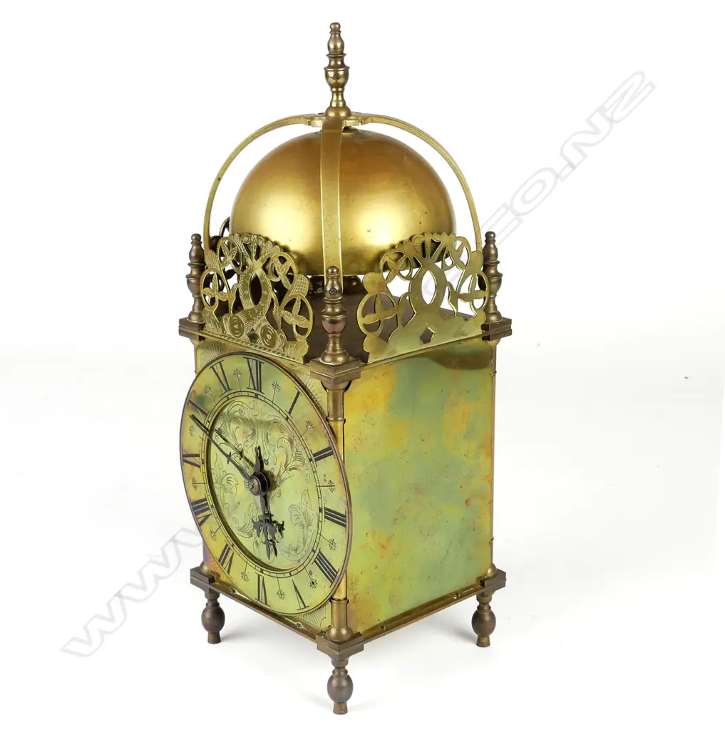 A brass lantern clock Image 1++