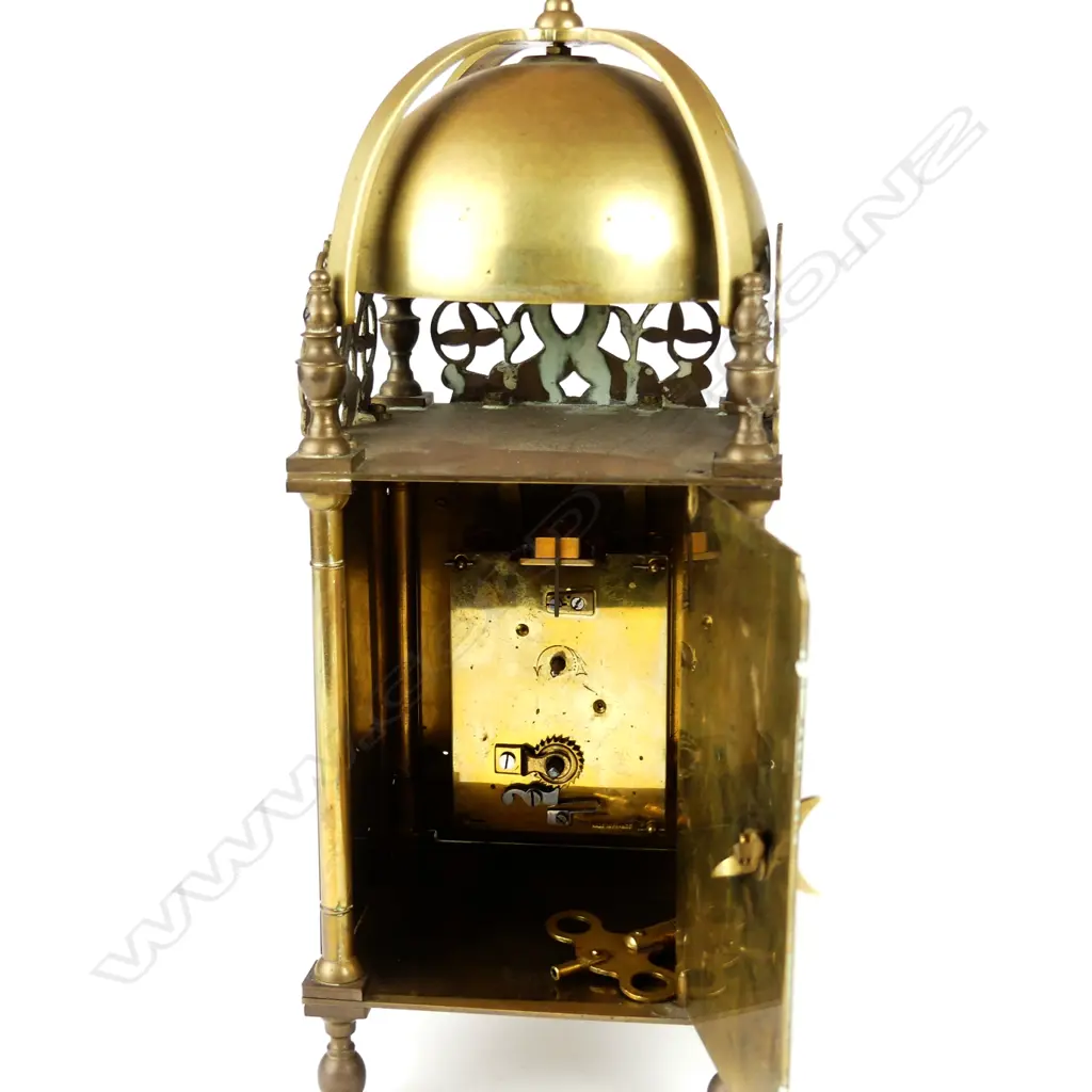 A brass lantern clock Image 1++