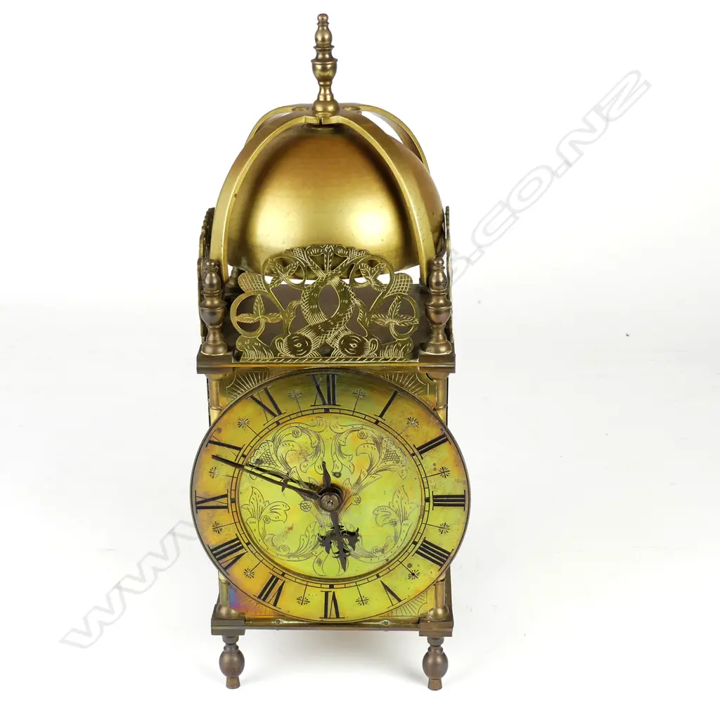 A brass lantern clock Image 1++