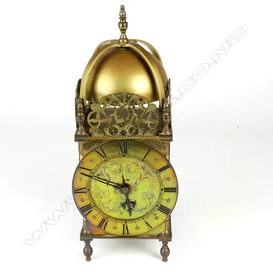 A brass lantern clock