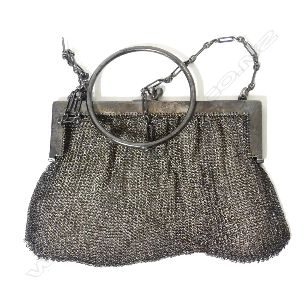A silver mesh purse Image 1++