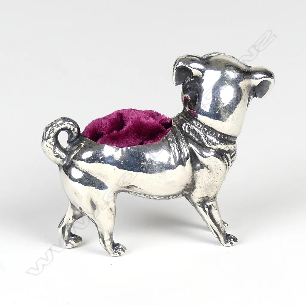 A rare early 20thC novelty dog silver pin cushion Image 1++