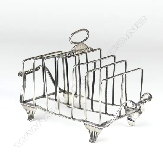 A Geo. III silver six slice toast rack