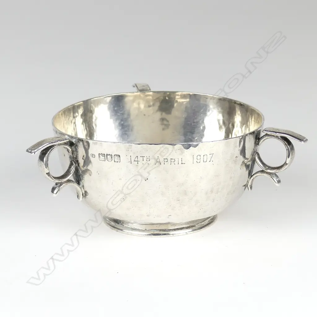 An Edwardian silver Arts and Crafts tyg Image 1++