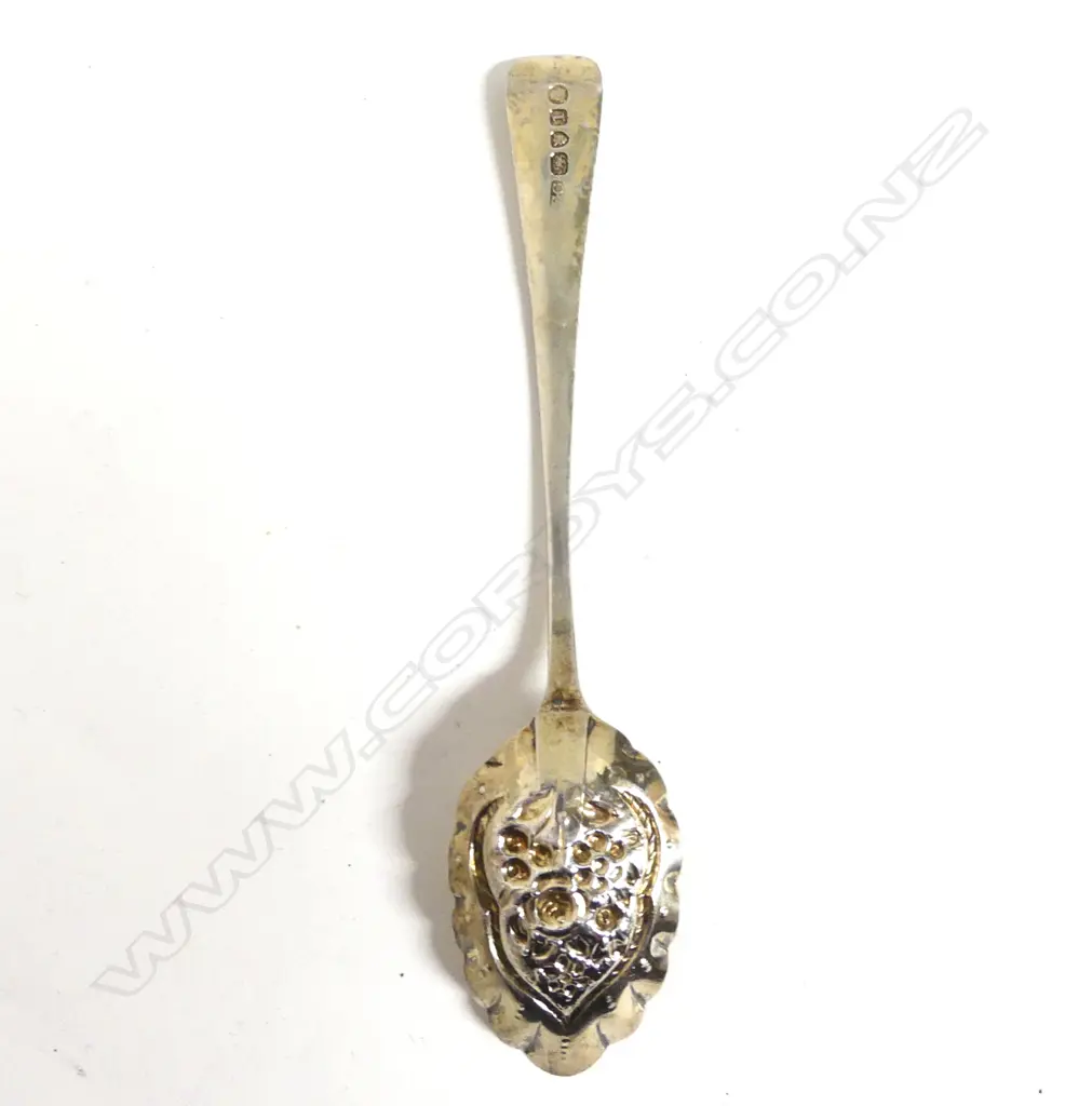 A George III silver berry spoon Image 1++