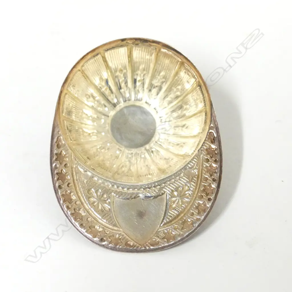 A silver jockey's cap caddy spoon Image 1++