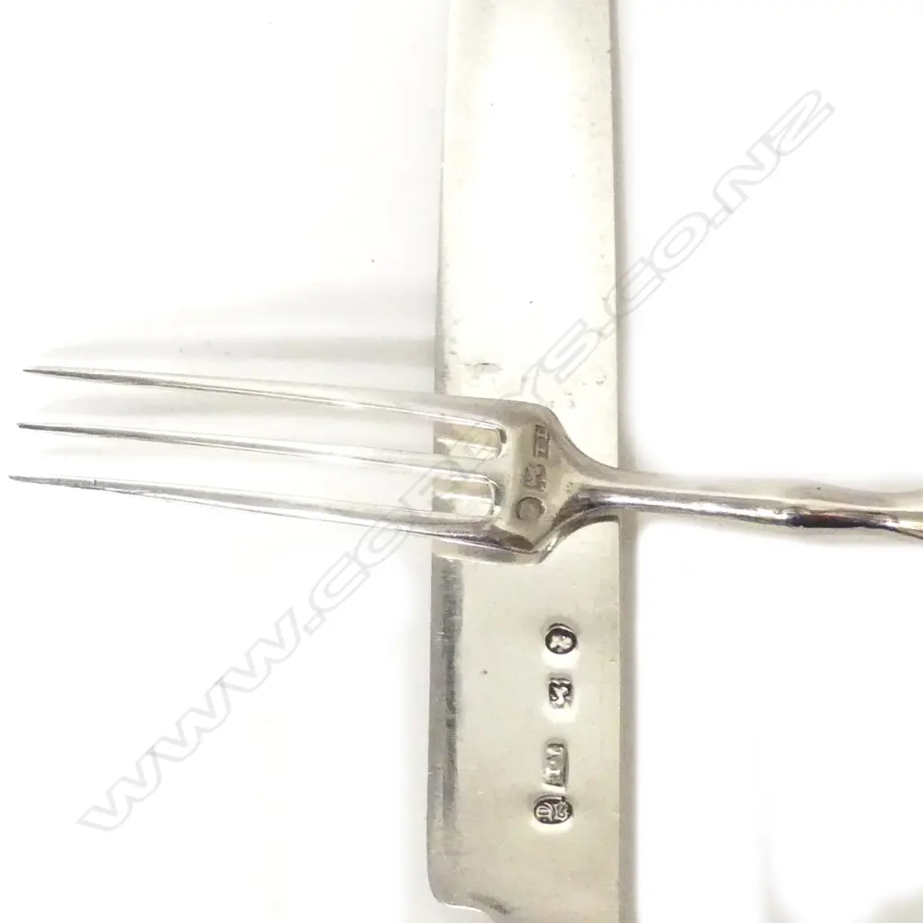 A 10-piece silver and ivory cutlery set Image 1++