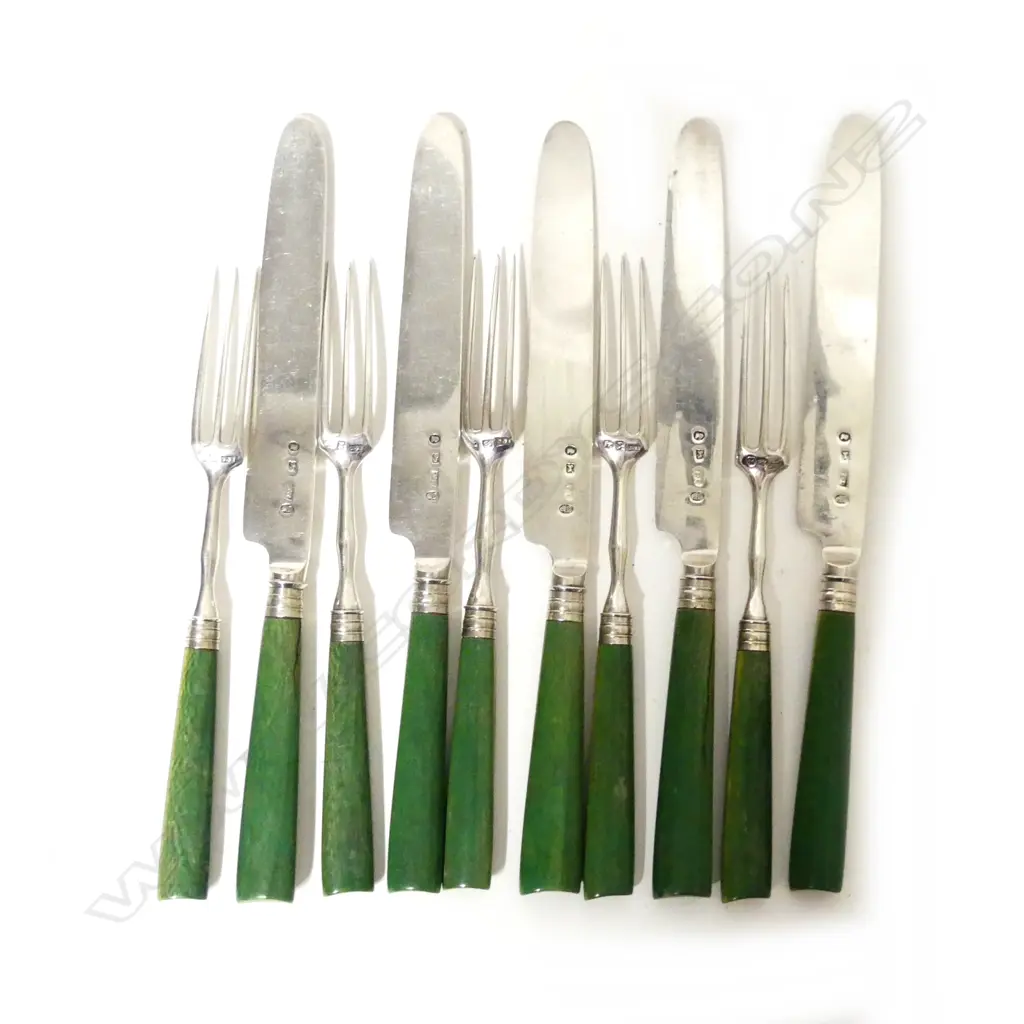 A 10-piece silver and ivory cutlery set Image 1++