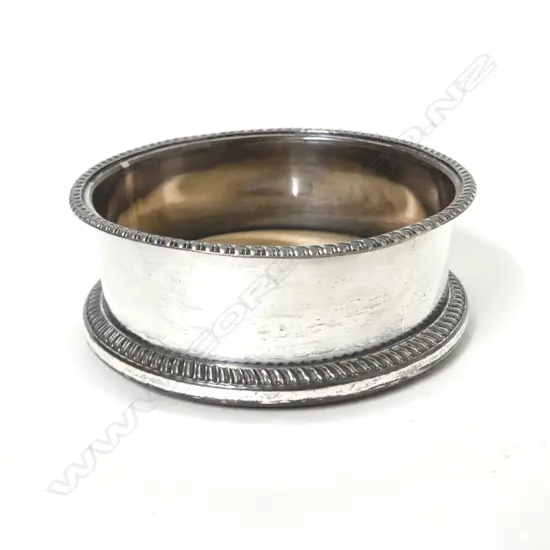 An old Sheffield plate bottle coaster