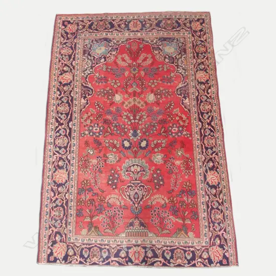 An antique hand knotted Kashan Mehrabi rug
