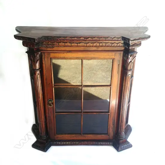 A reproduction Victorian mahogany display cabinet