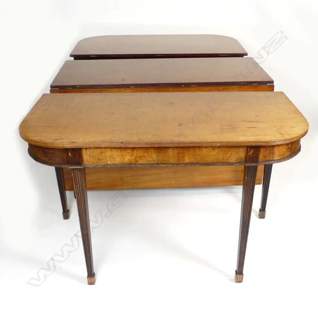 A Georgian mahogany D-end dining table Image 1++