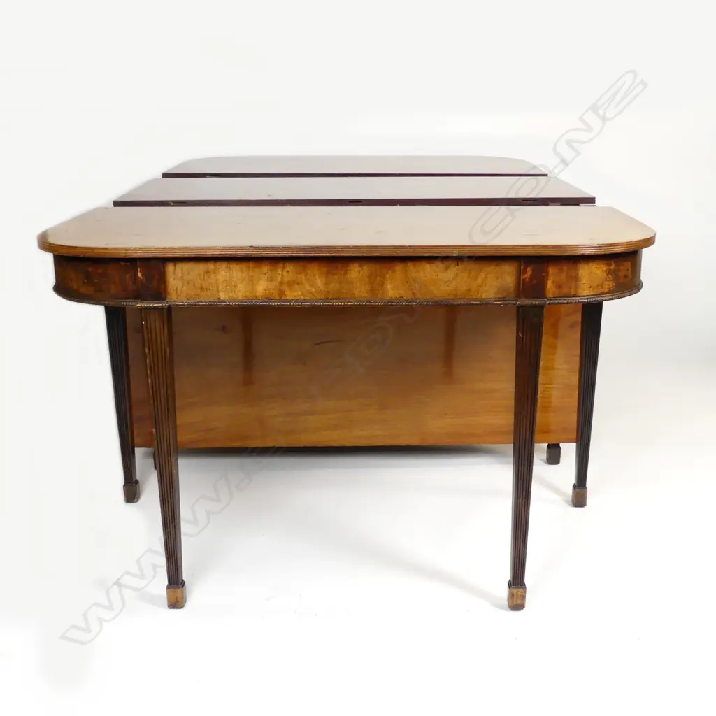 A Georgian mahogany D-end dining table Image 1++