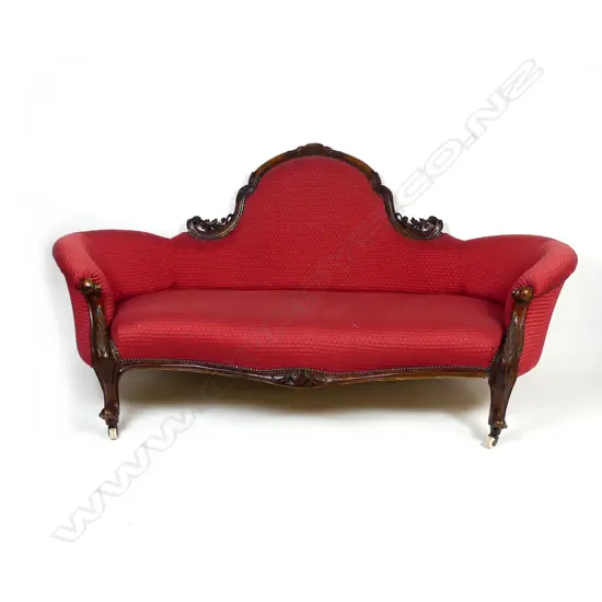 A Victorian walnut framed sofa