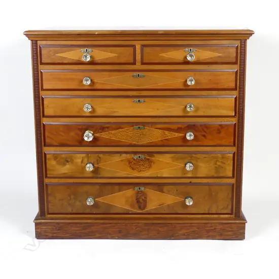 An unusual colonial native woods chest of drawers