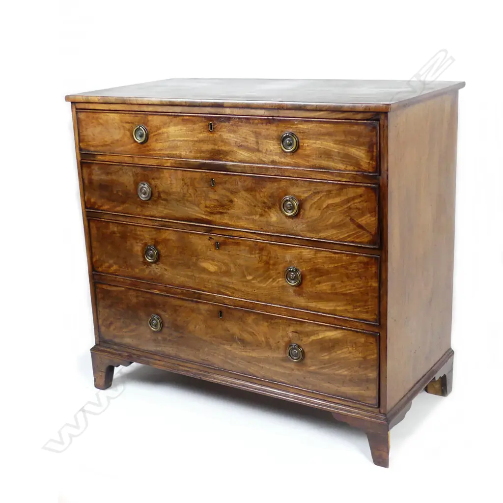 A Georgian mahogany flat front chest of four drawers Image 1++