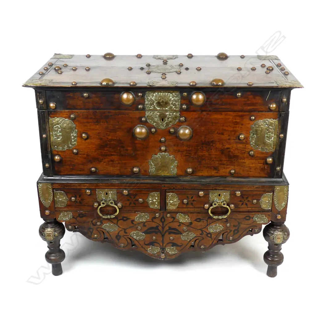 A Dutch-Indonesian teak coffer on turned legs Image 1++